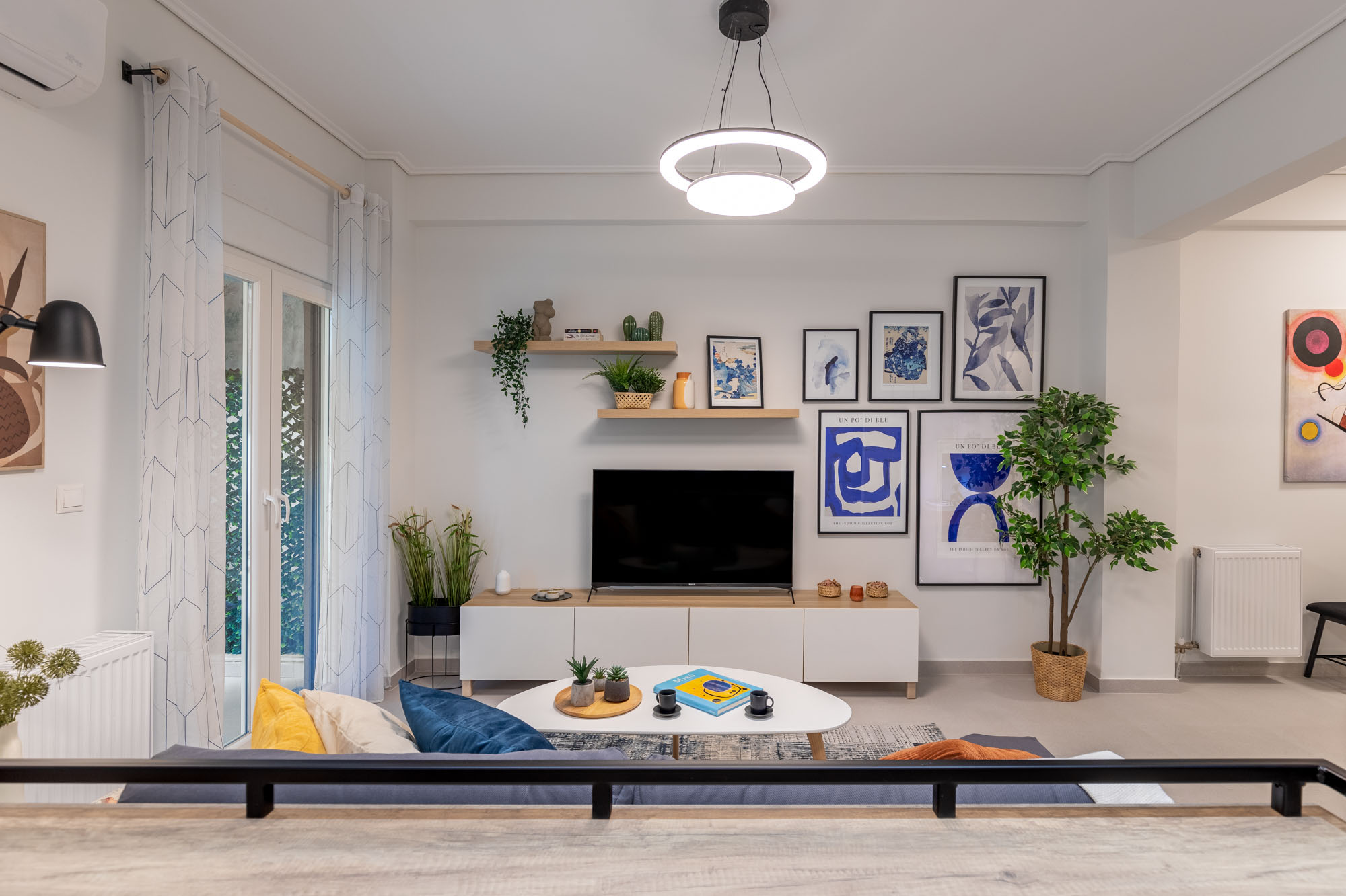 Bright living area of the Modern & Stylish apartment