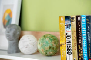 Decorative books and objects in the Bright and Comfortable apartment